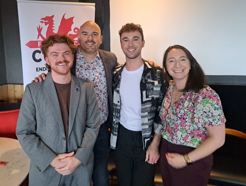 Richard Angell with the WElsh staff of Terrence Higgins Trust.