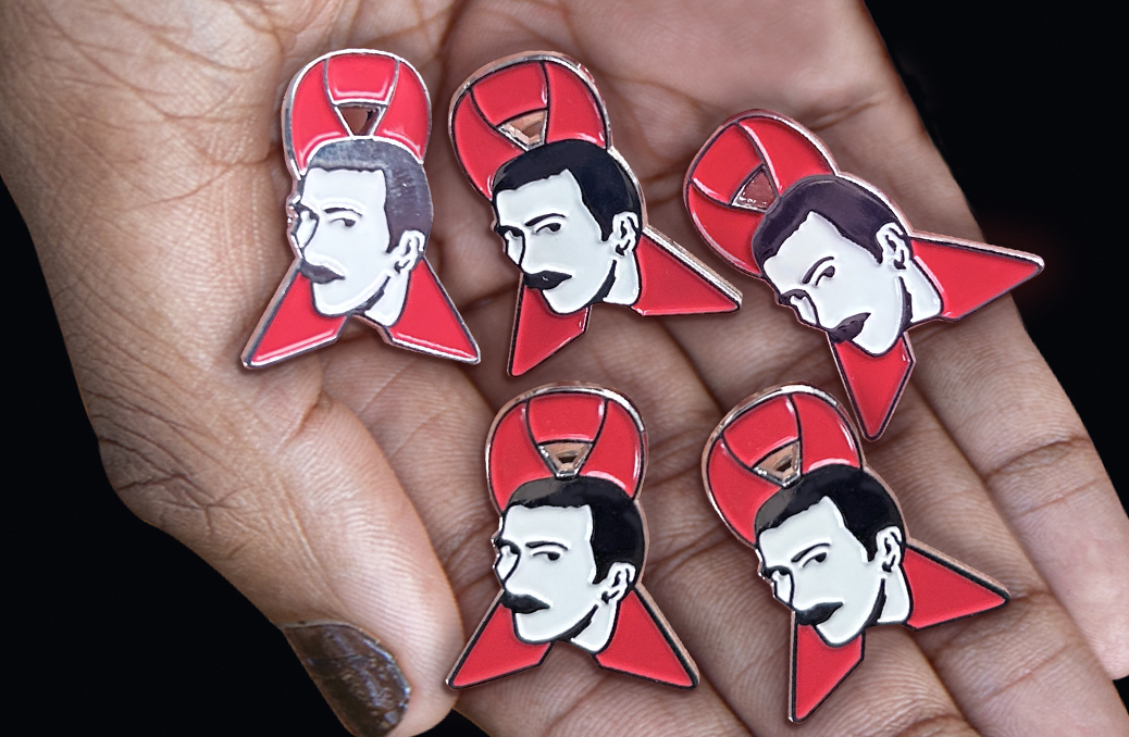 Red pins with Terry Higgins likeness.
